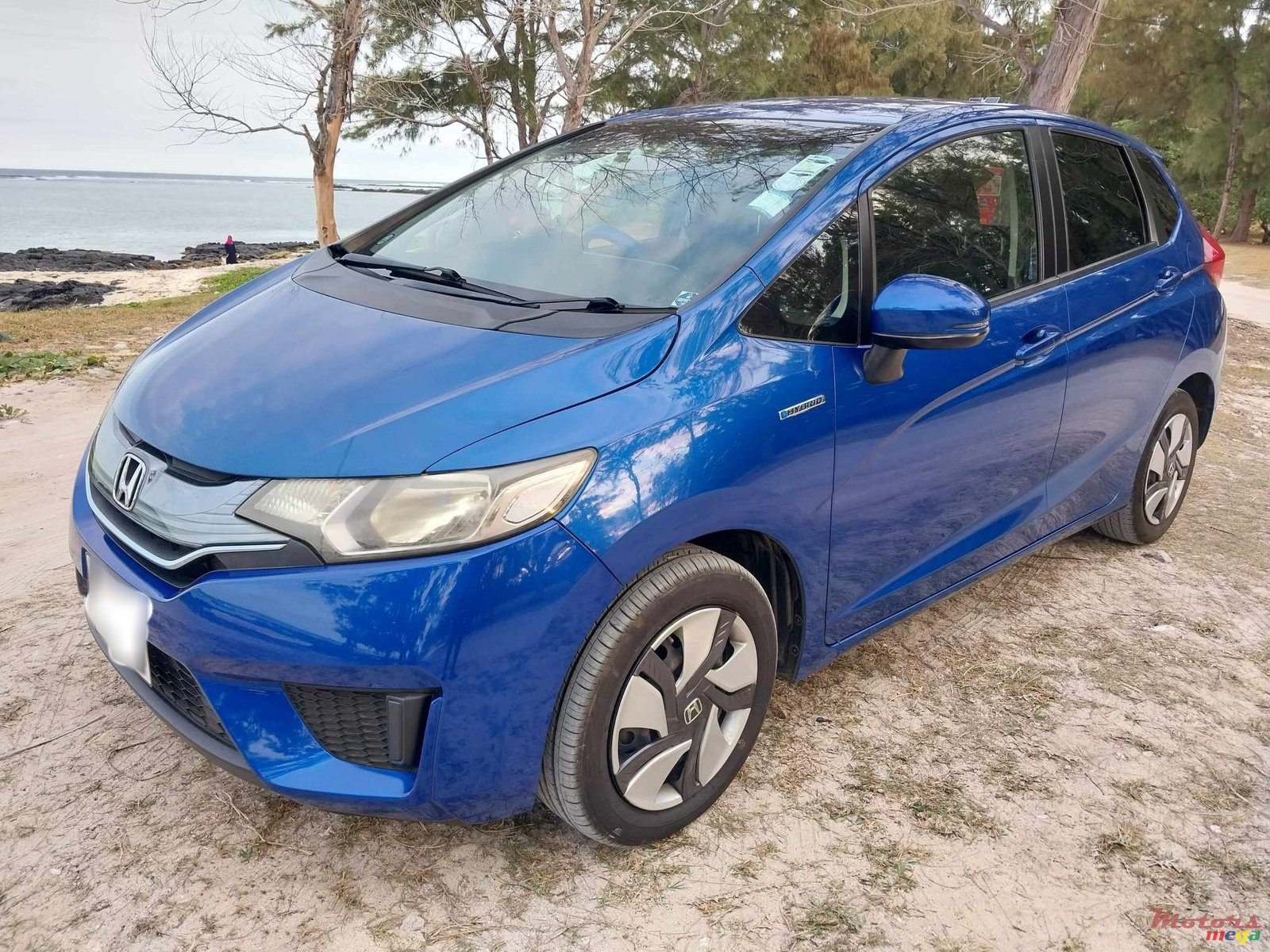 2014' Honda Fit Hybrid photo #1