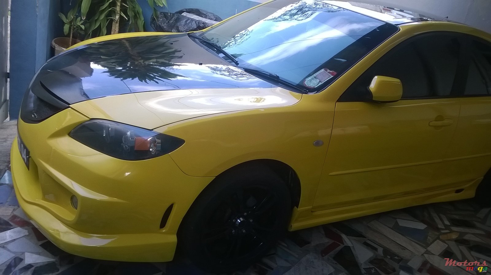 2004' Mazda 3 sport photo #1