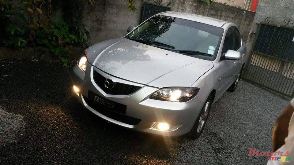 2004' Mazda 3 photo #1