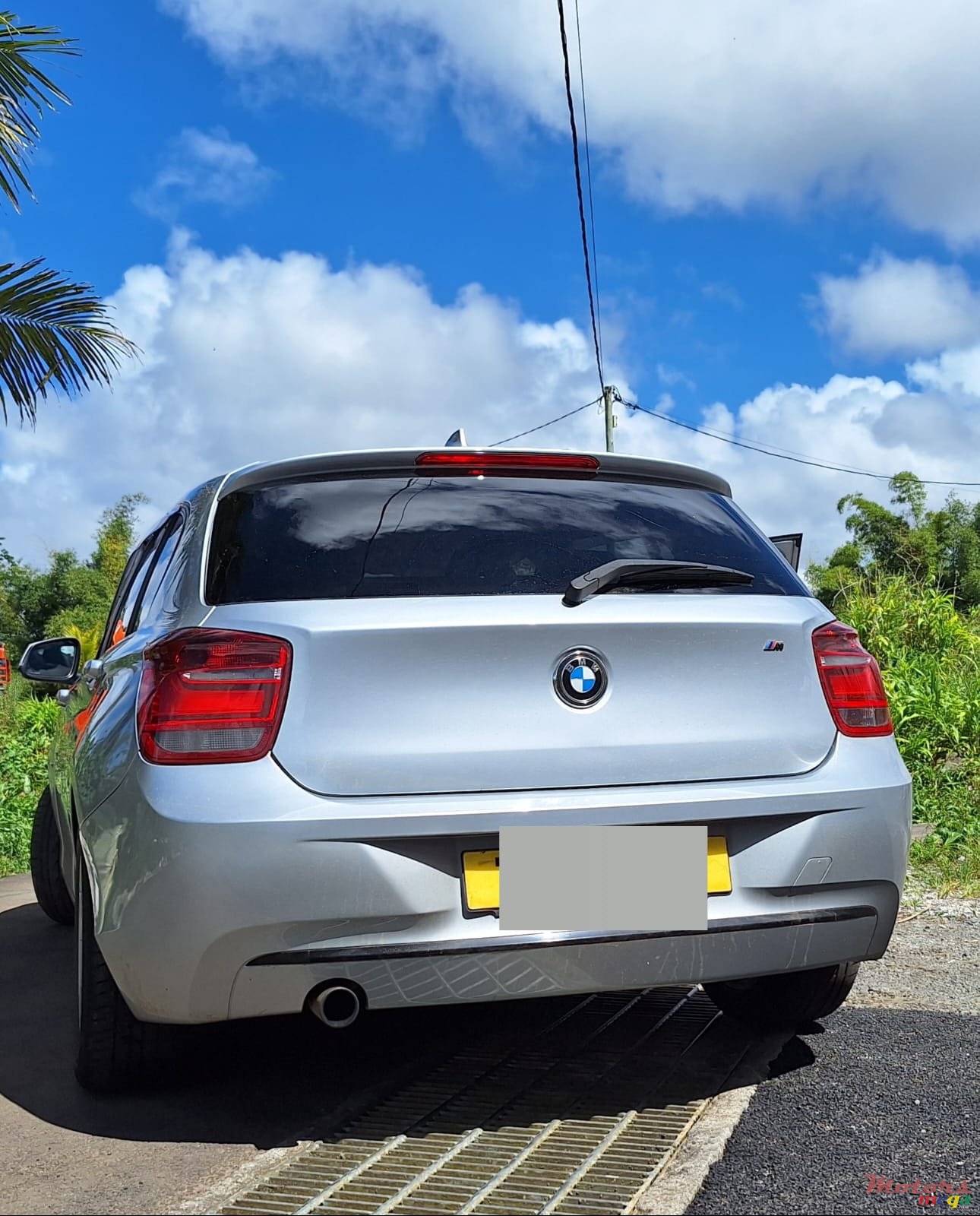 2012' BMW 116 F20 Sport photo #1