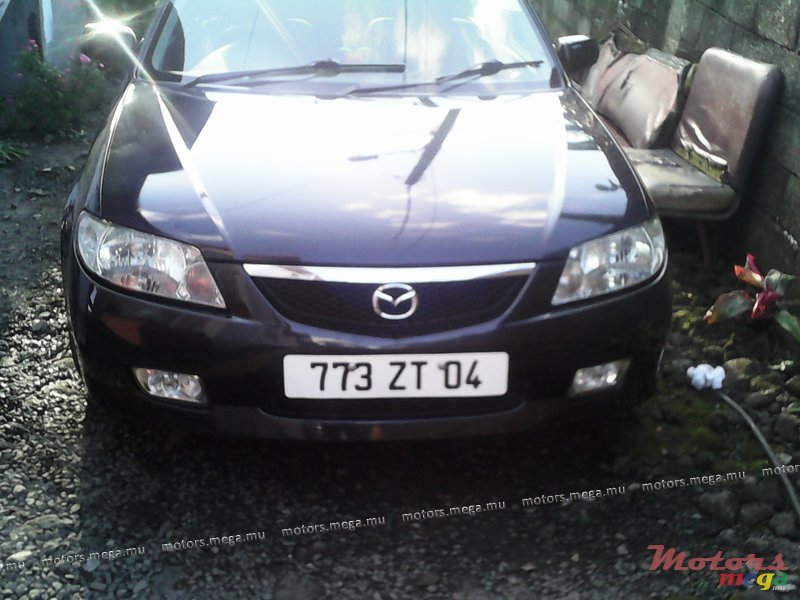 2004' Mazda 323 photo #1