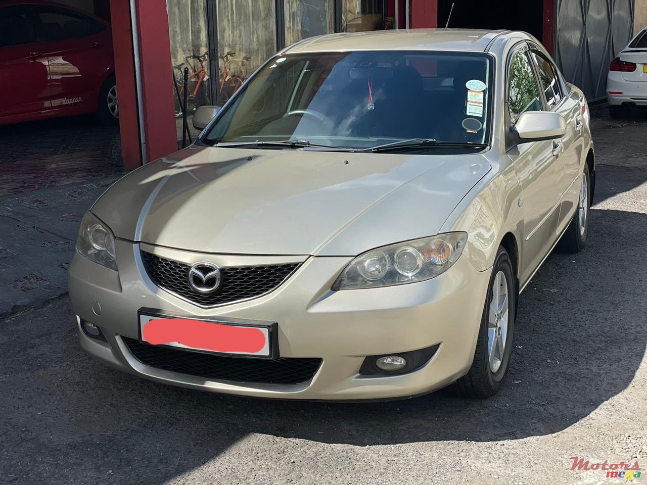 2006' Mazda 3 photo #1