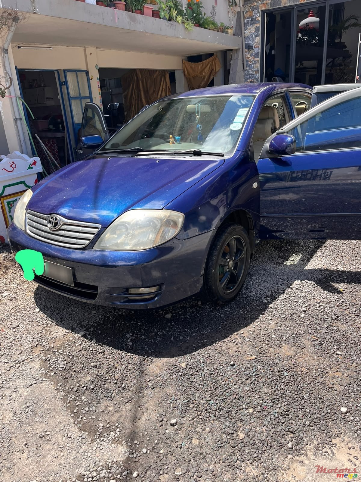 2003' Toyota Corolla NZE photo #3