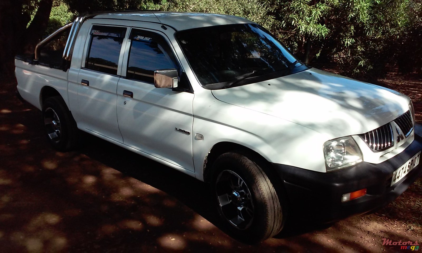 2007' Mitsubishi Warroir photo #1