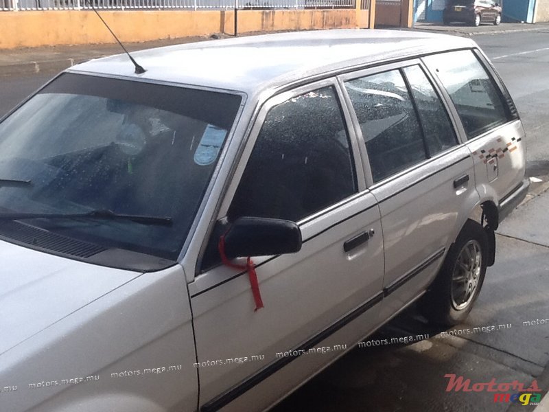 1990' Mazda 323 Autovan photo #1