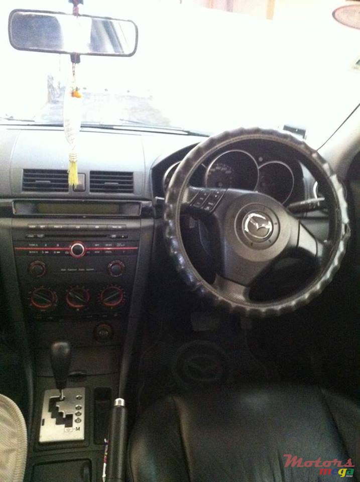 2004' Mazda 3 photo #1