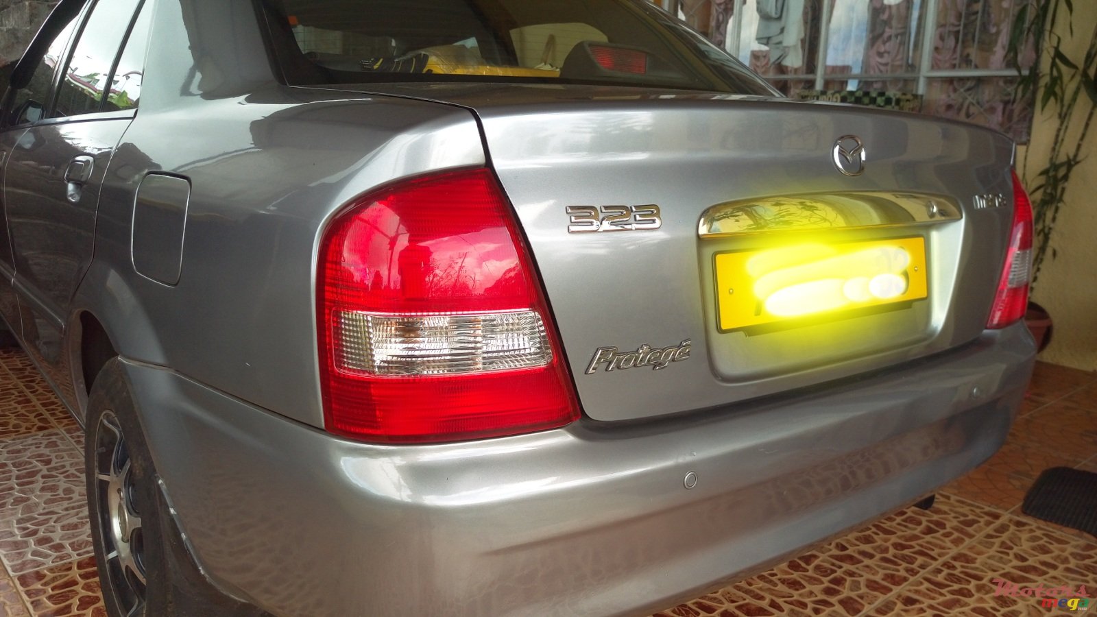 2003' Mazda 323 photo #2