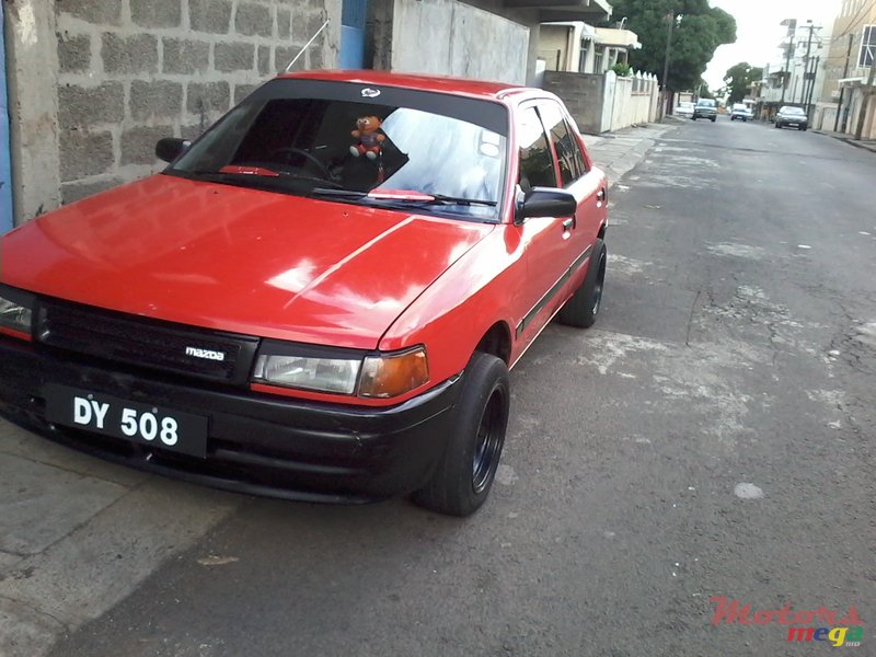 1990' Mazda 323 photo #1