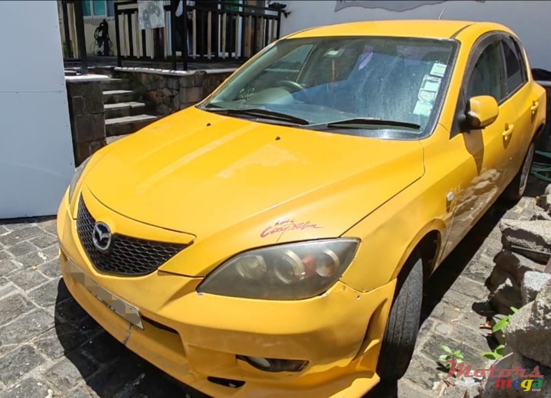 2004' Mazda 3 photo #1