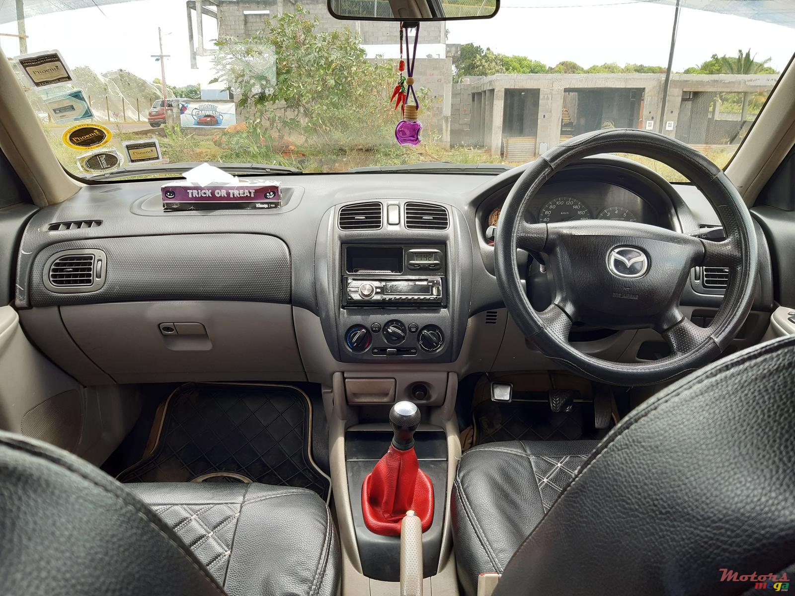 2002' Mazda 323 photo #7