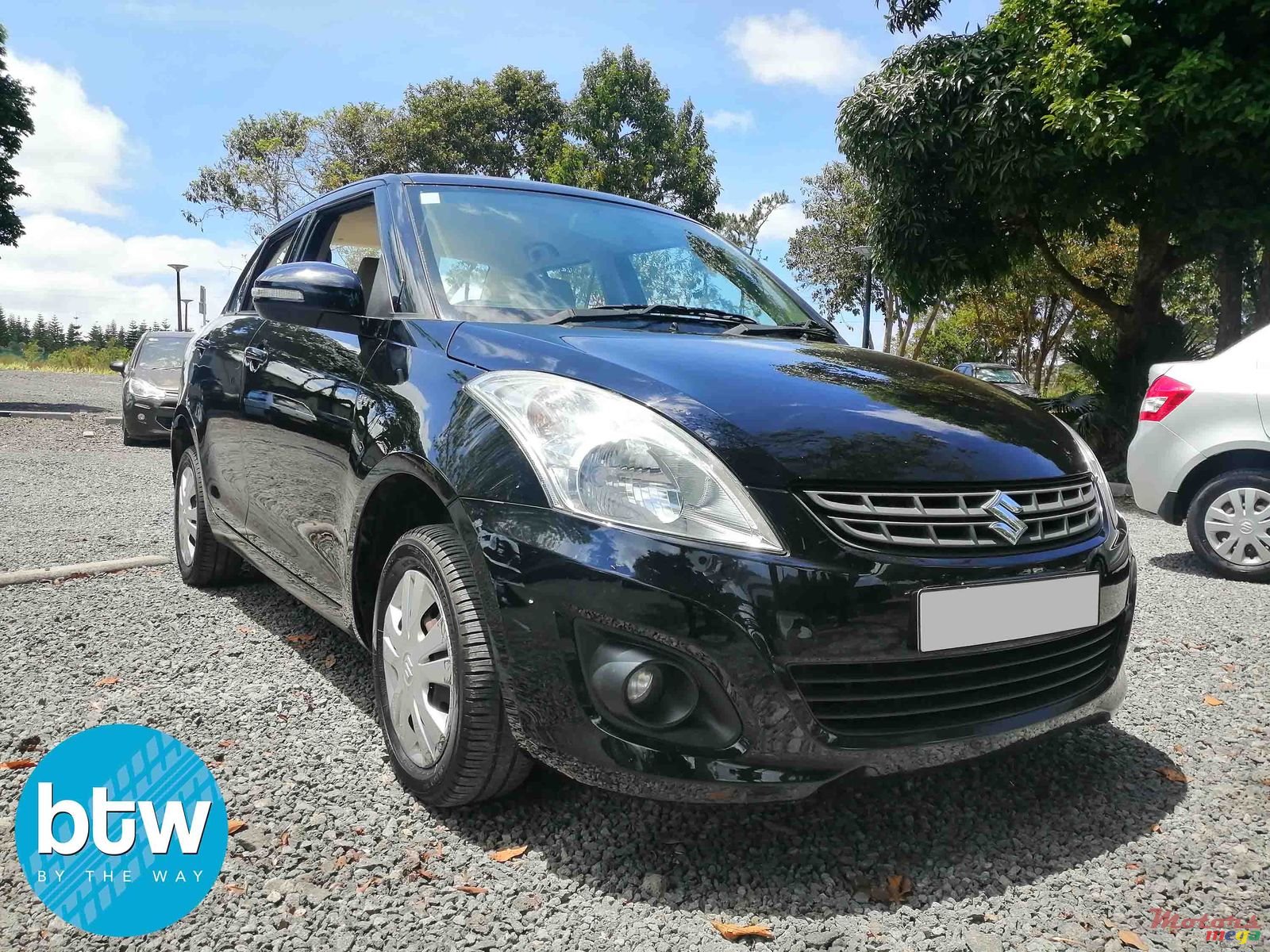 2014' Suzuki Swift Dzire photo #1