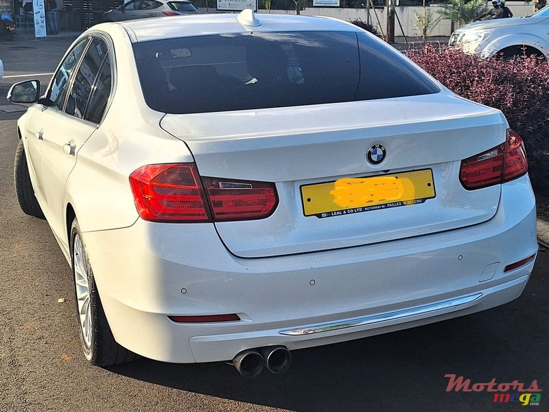 2015' BMW 3 Series Sedan photo #2