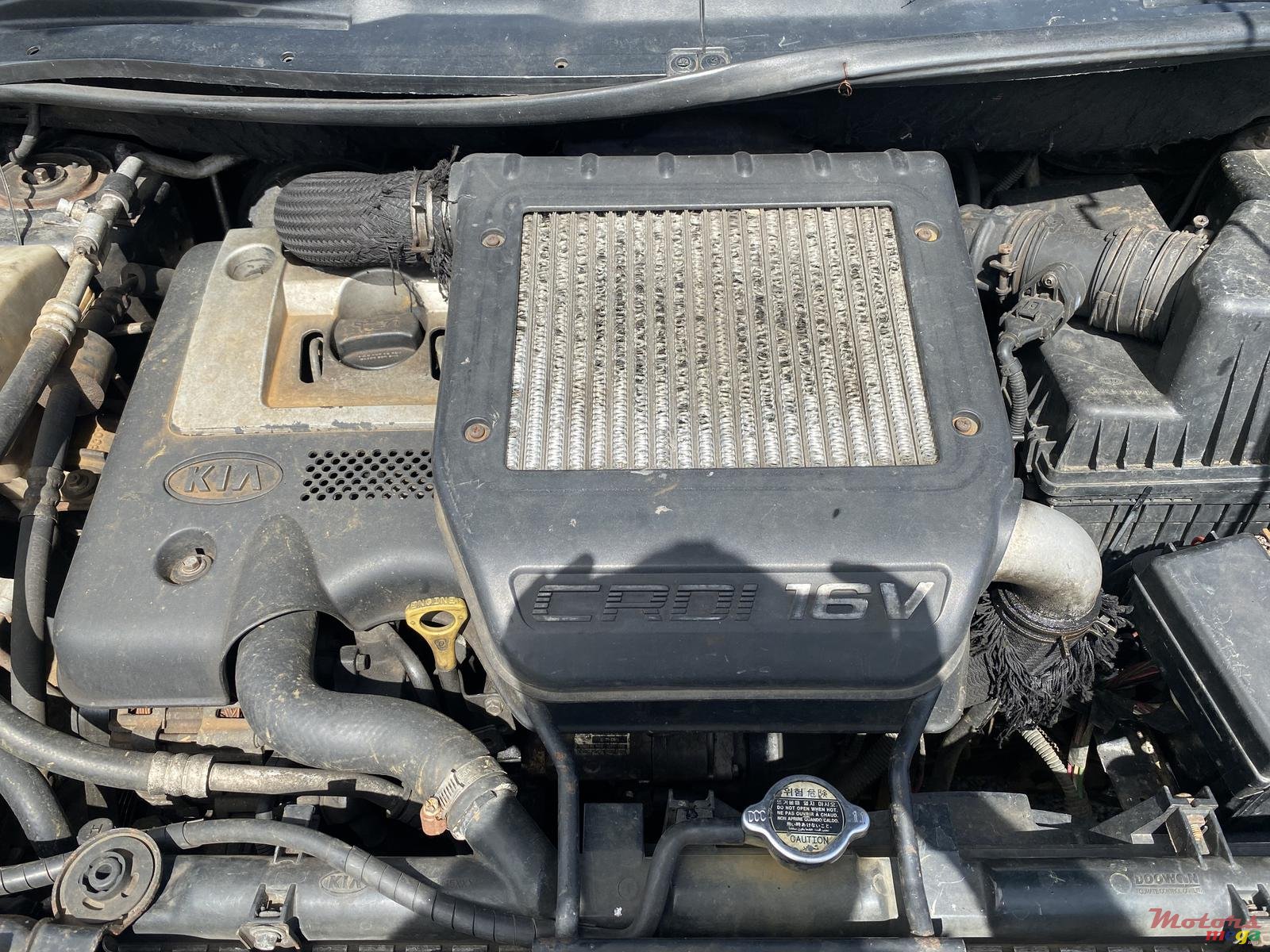 2005' Kia Carens 7 places photo #2