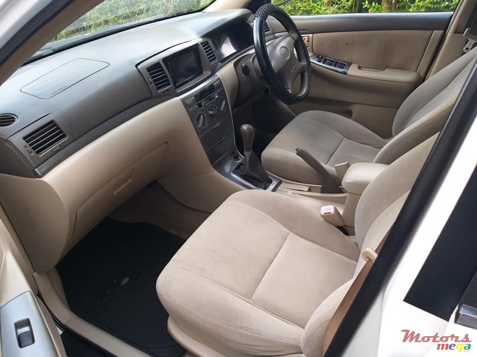 2004' Toyota Corolla NZE photo #5