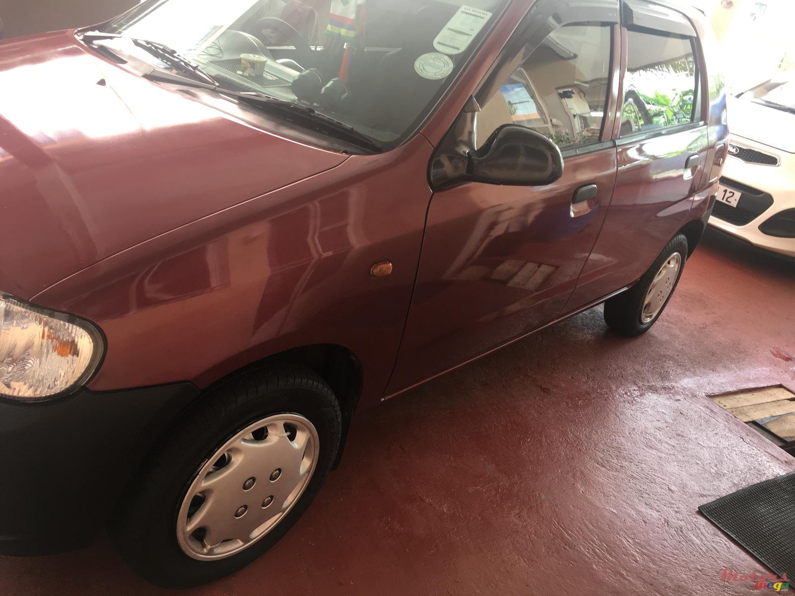 2011' Suzuki Alto photo #5