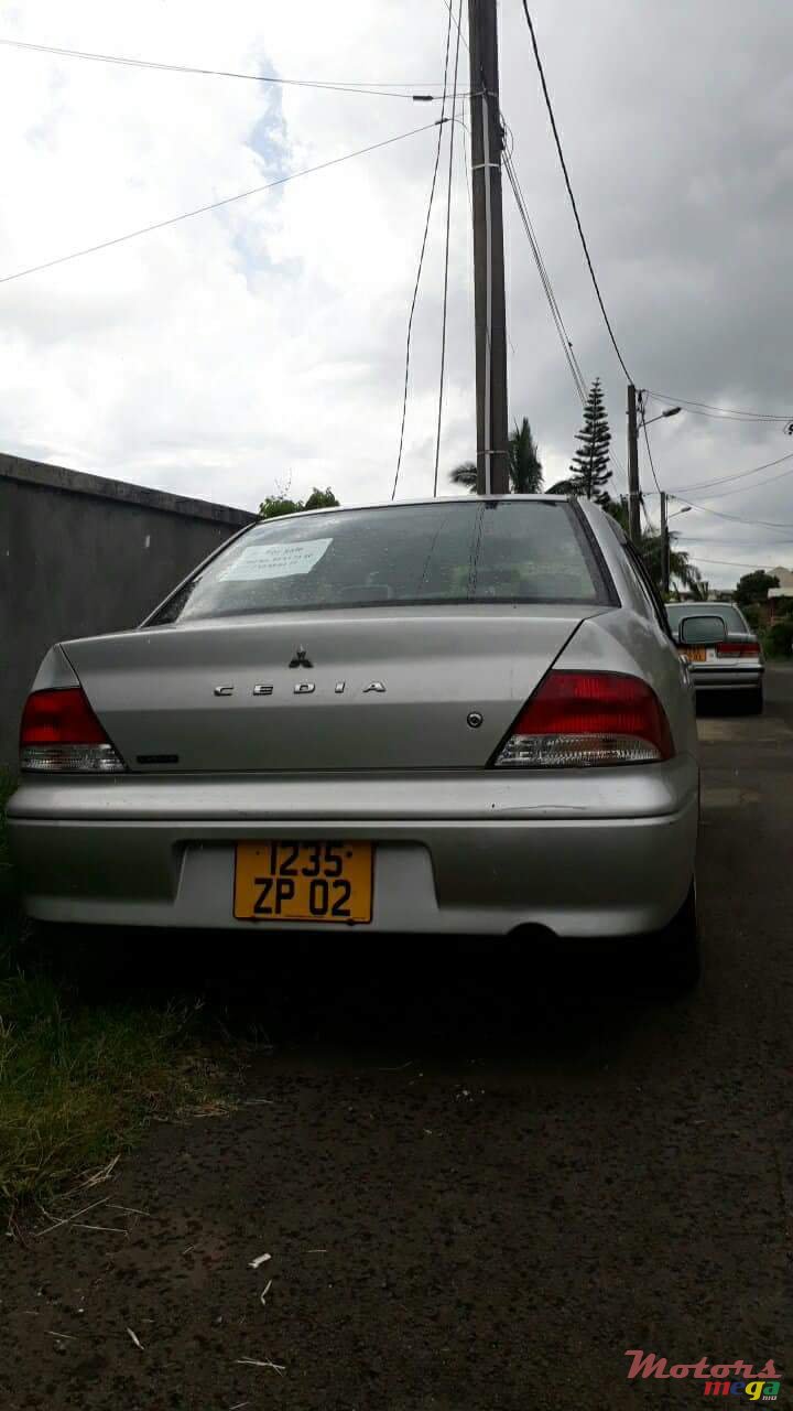 2002' Mitsubishi Lancer GLX photo #1