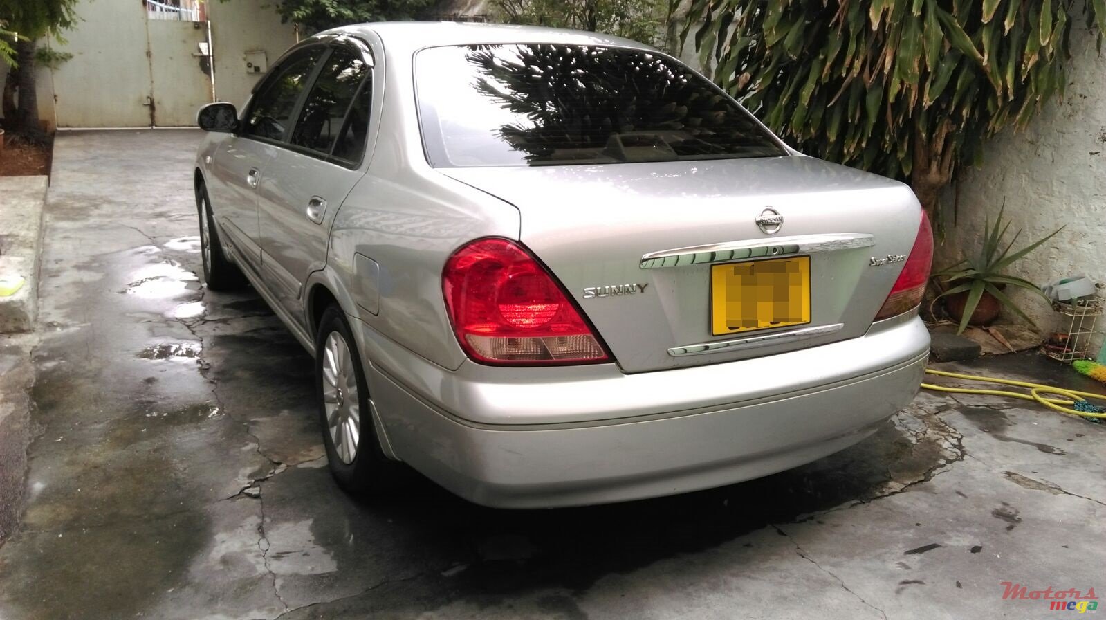 2006' Nissan Sunny photo #2