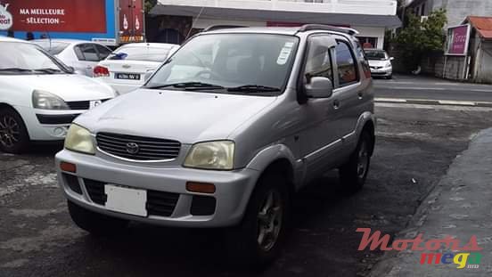 2000' Toyota Cami photo #2