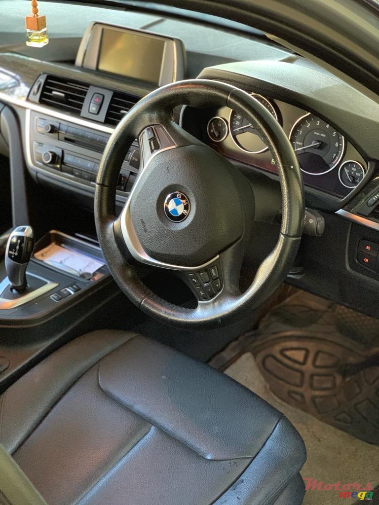 2014' BMW 316 photo #3