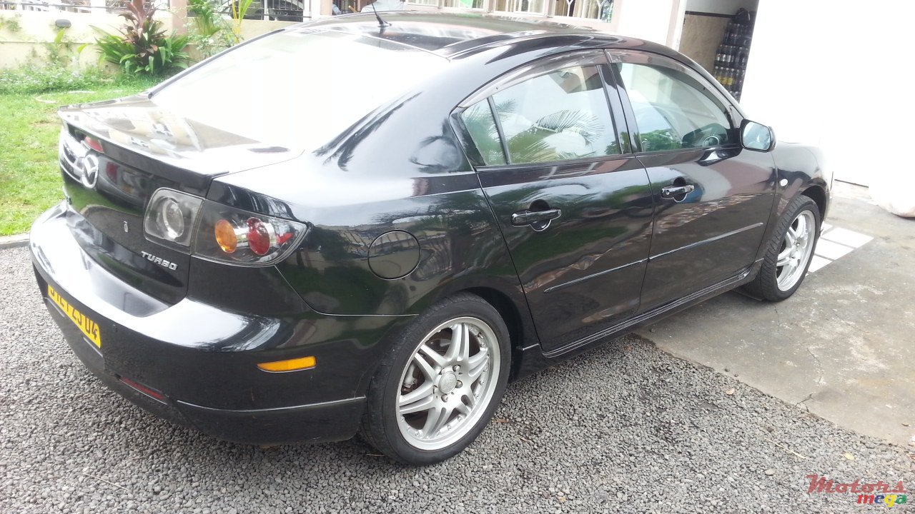 2005' Mazda 3 photo #1