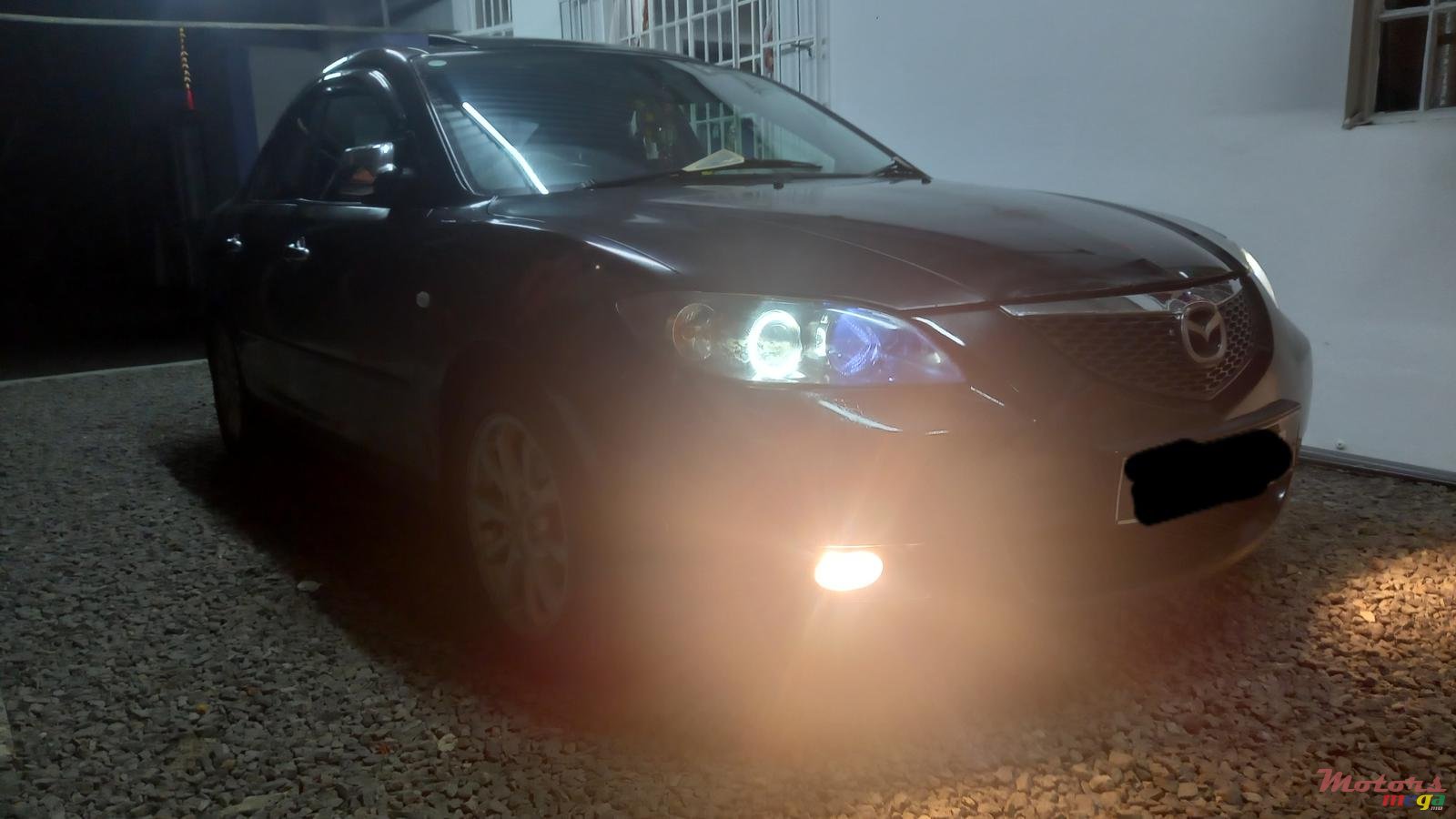 2006' Mazda 3 photo #1