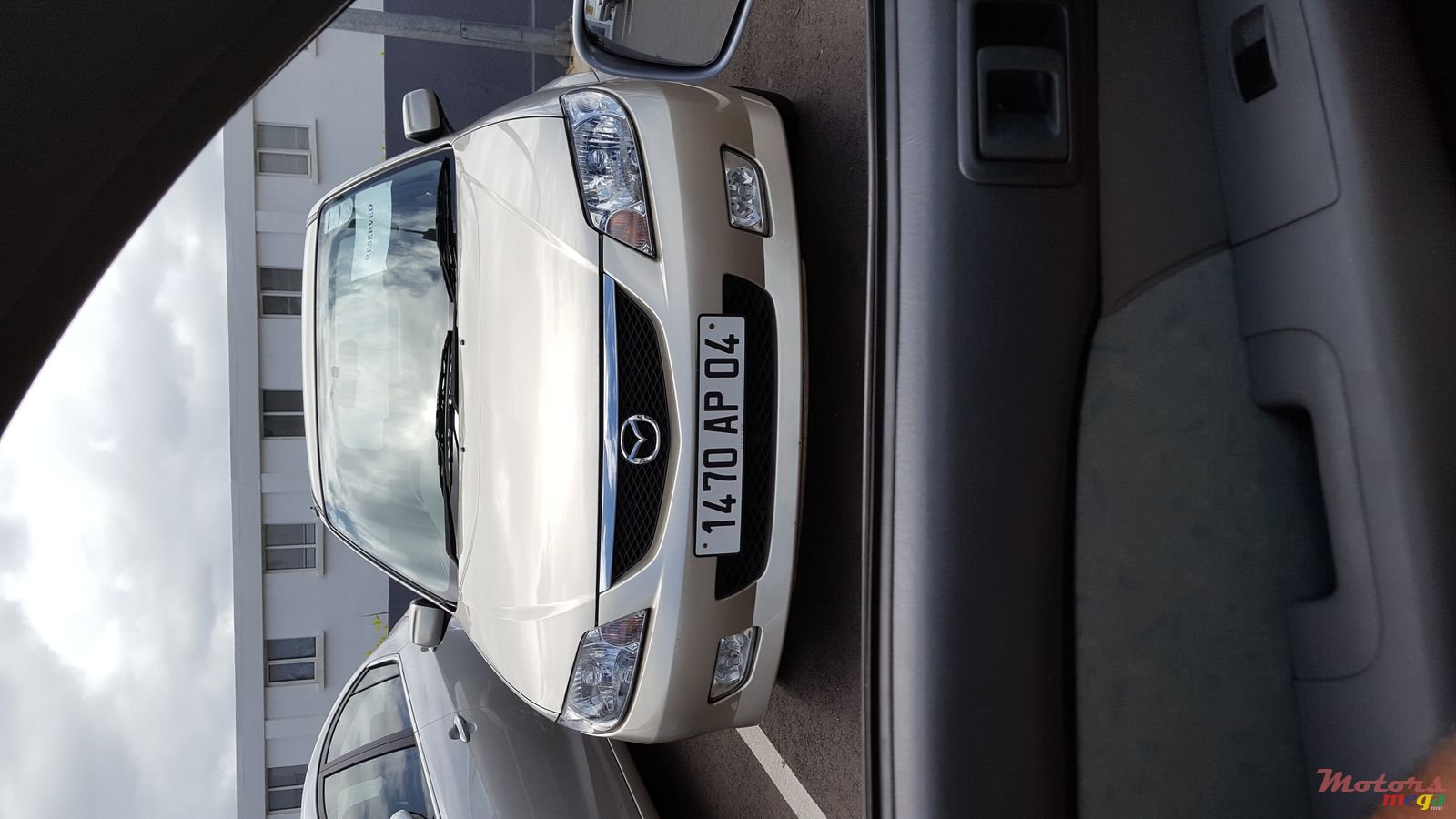 2004' Mazda 323 Glx photo #1