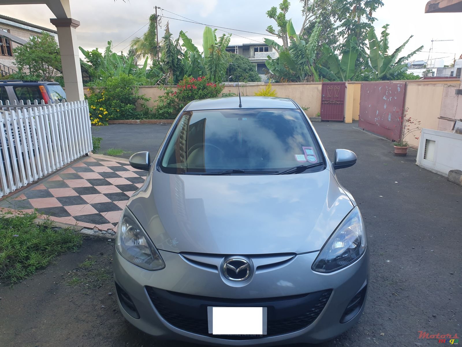 2012' Mazda Demio photo #1