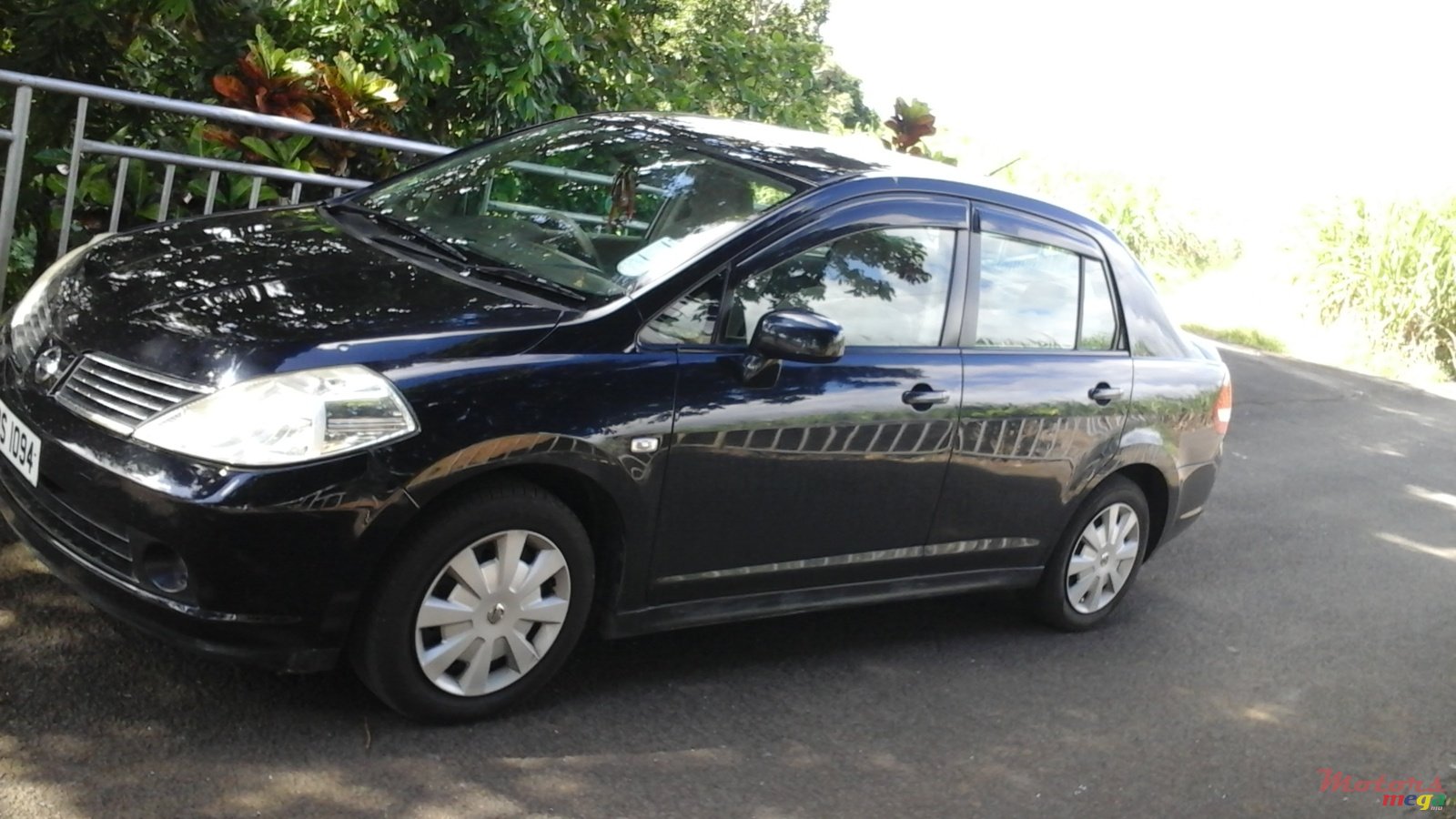 2006' Nissan Tiida photo #1