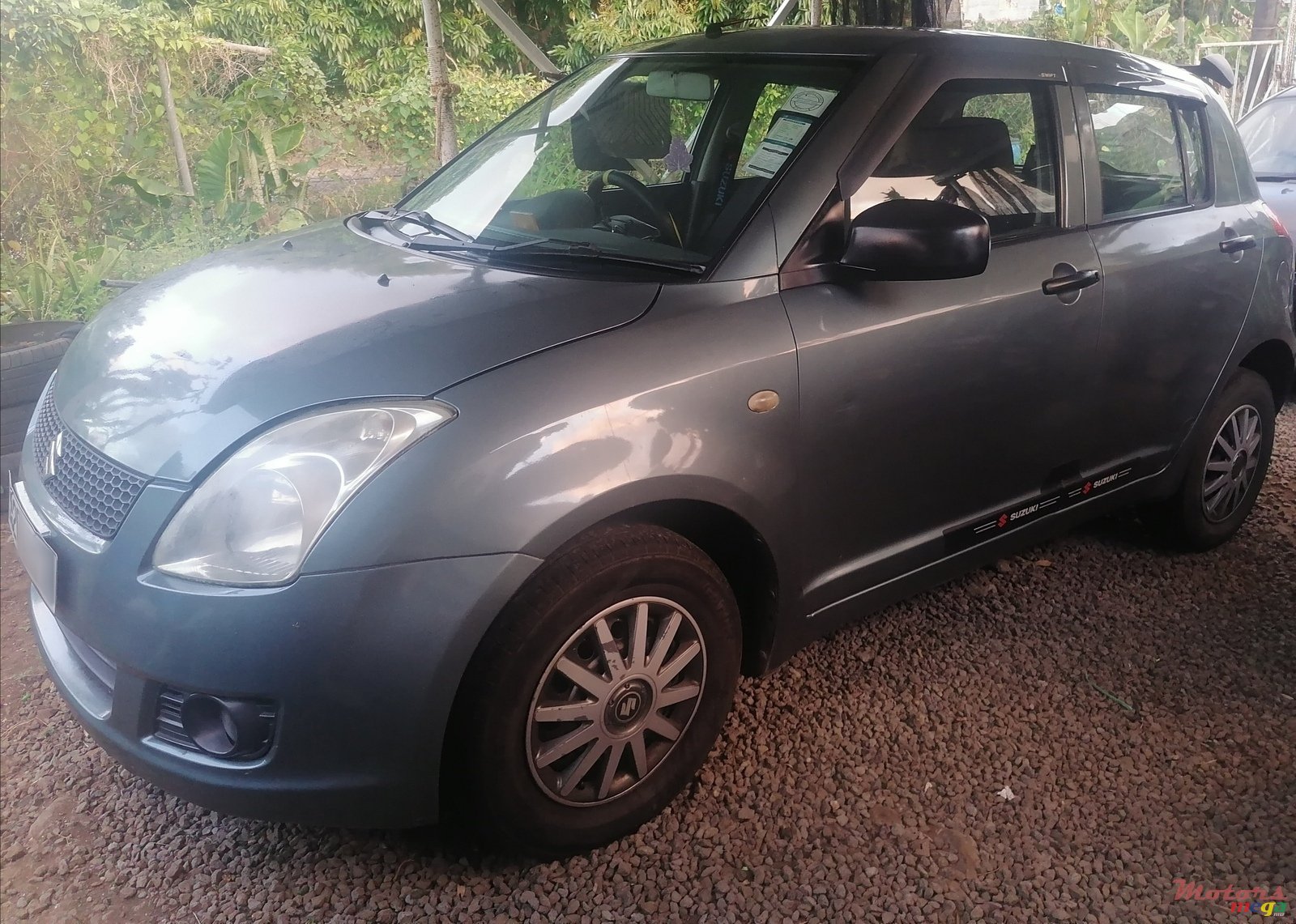 2009' Suzuki Swift photo #1