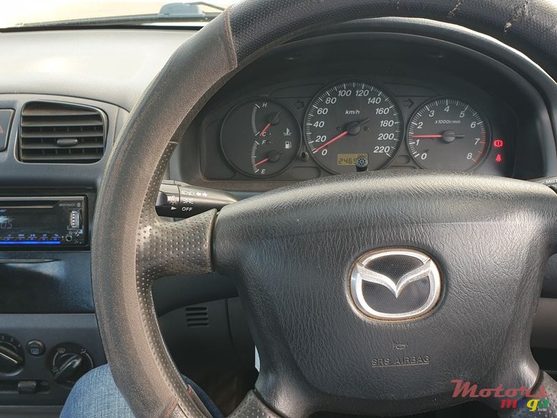 2002' Mazda 323 1324 cc photo #7