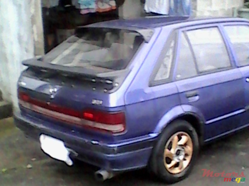1995' Mazda 323 photo #5