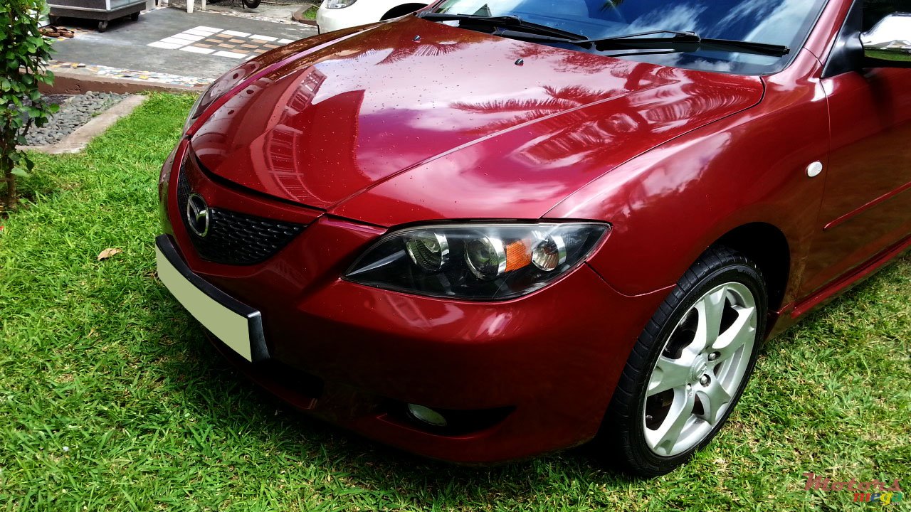 2004' Mazda 3 photo #1