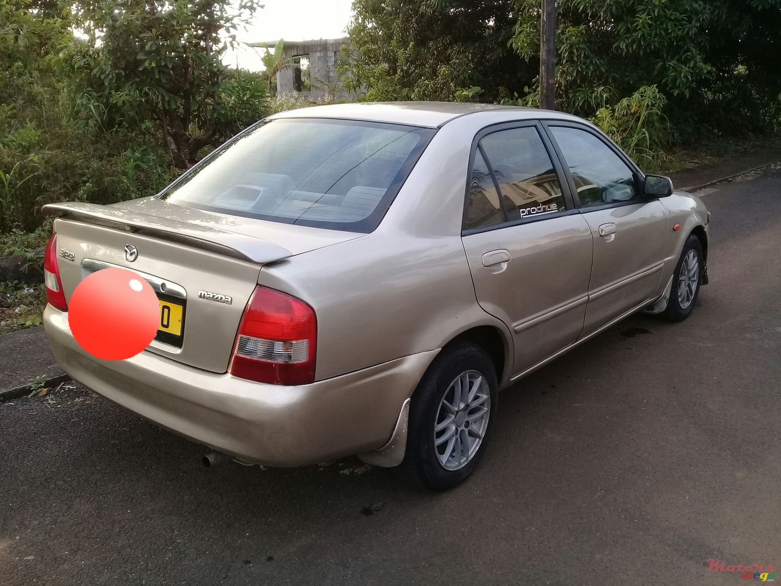 2000' Mazda 323 photo #1