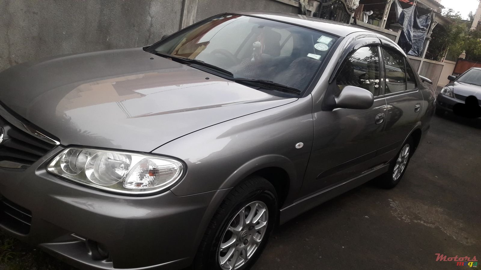 2012' Nissan Sunny photo #1