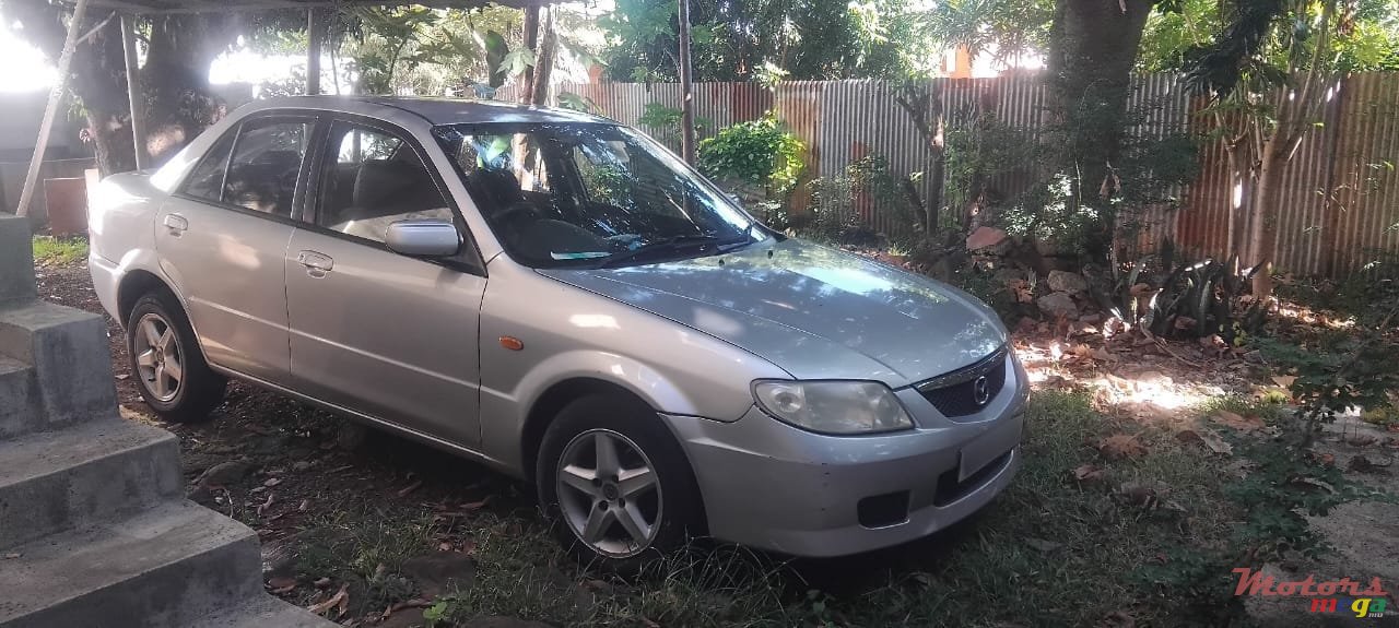 2003' Mazda 323 photo #1