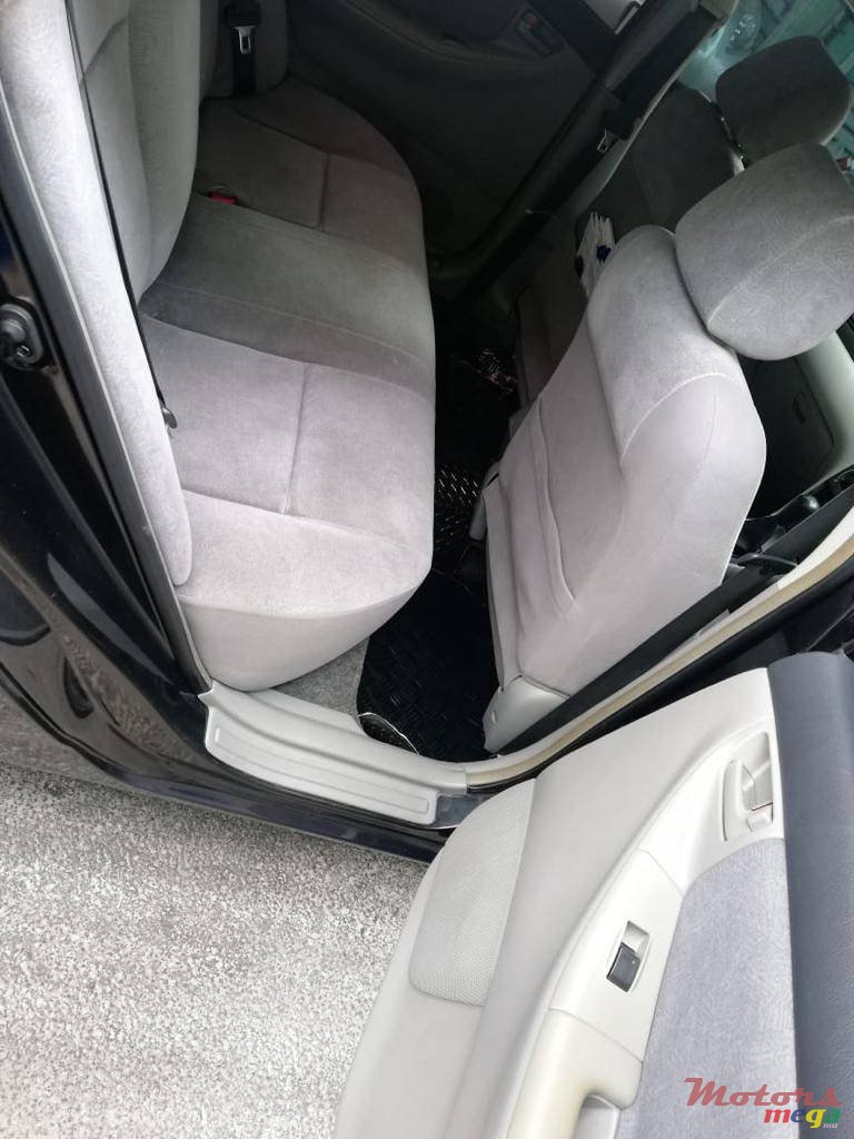 2002' Toyota Corolla NZE photo #3