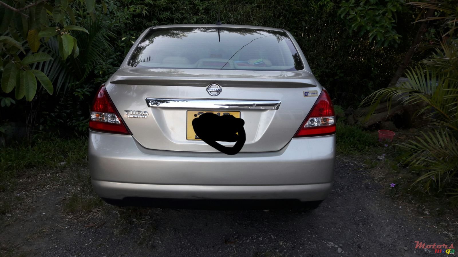 2004' Nissan Tiida photo #2