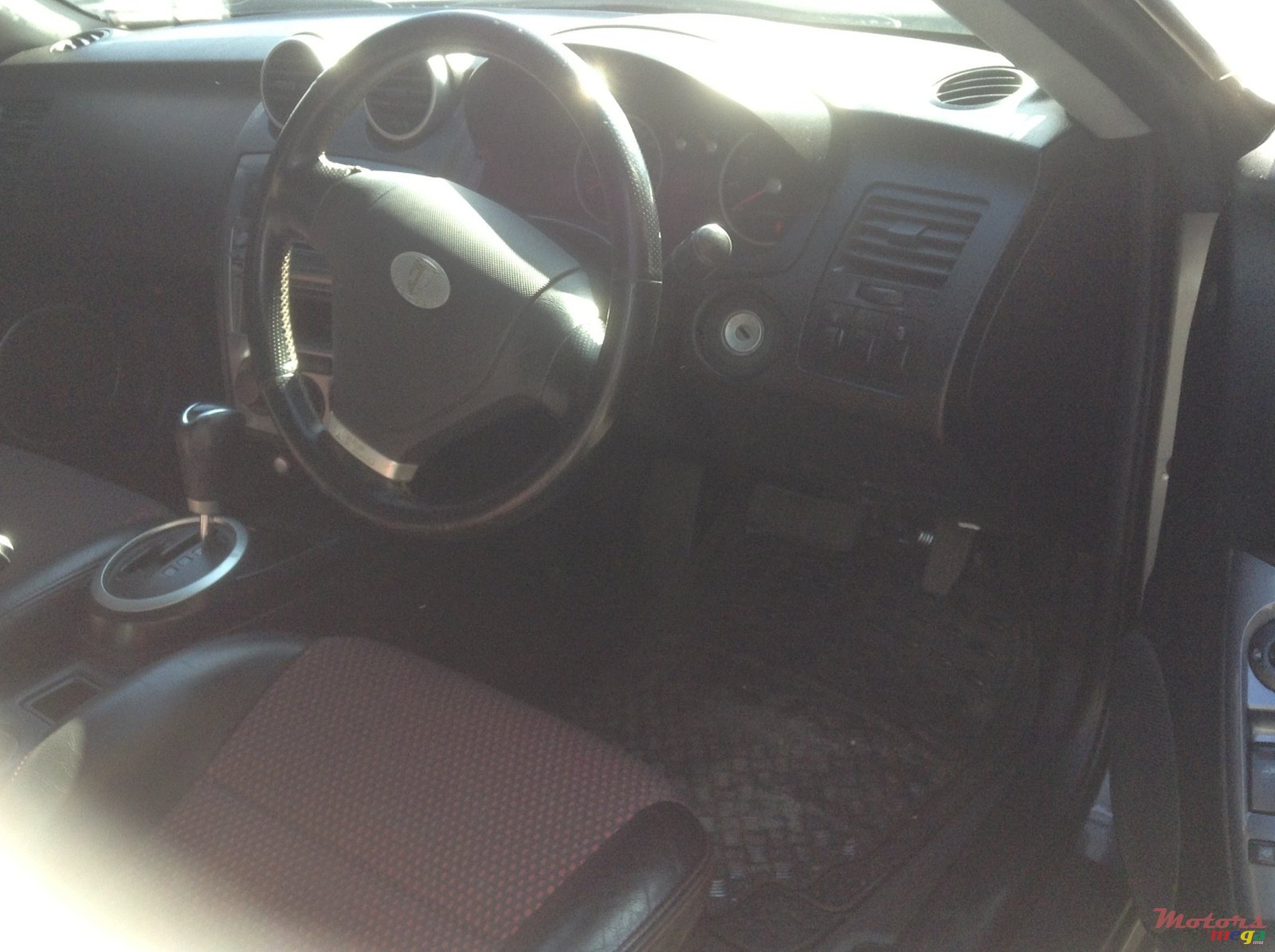 2006' Hyundai Tuscani photo #4