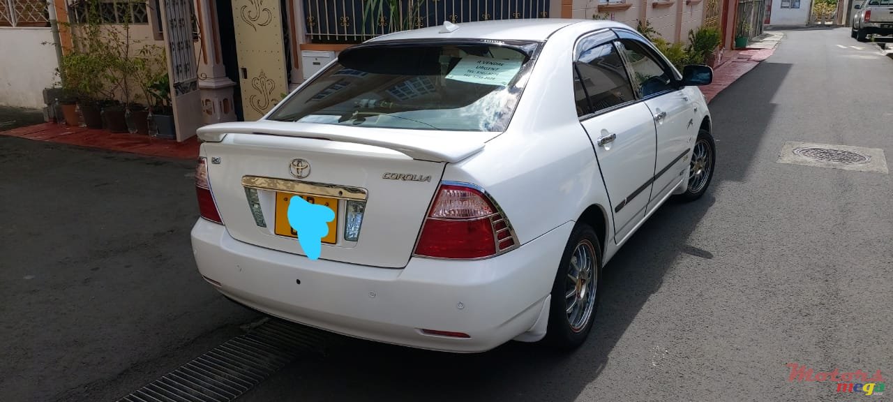 2006' Toyota iQ NZE photo #1