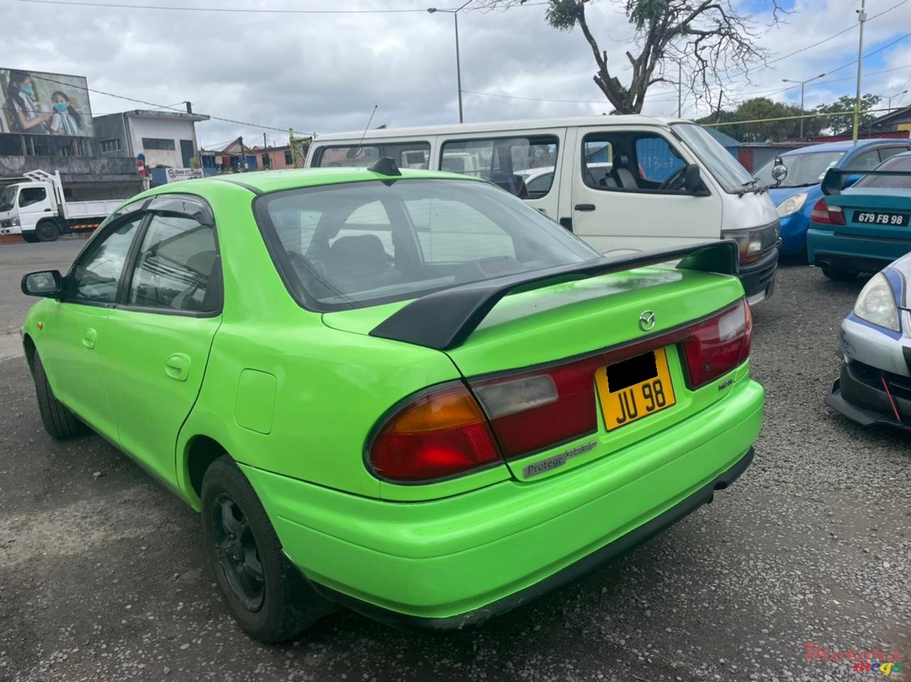 1998' Mazda 323 photo #1