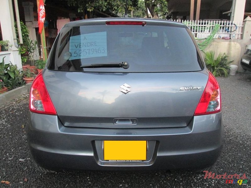 2009' Suzuki Swift photo #3