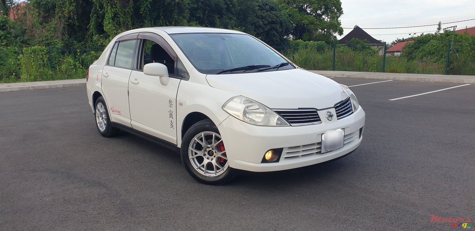 2006' Nissan Tiida photo #1