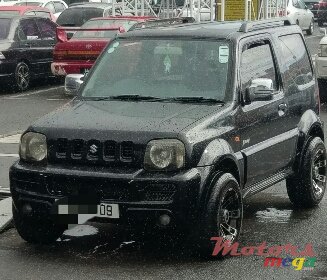 2009' Suzuki Jimny photo #1