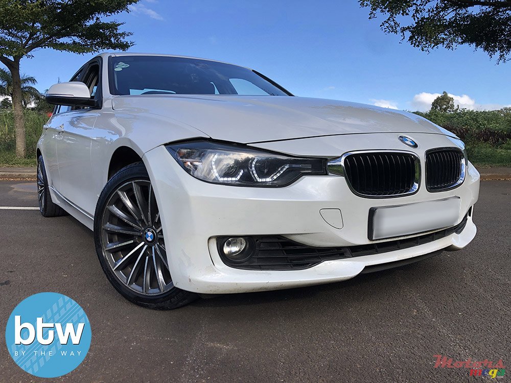 2012' BMW 318 photo #1