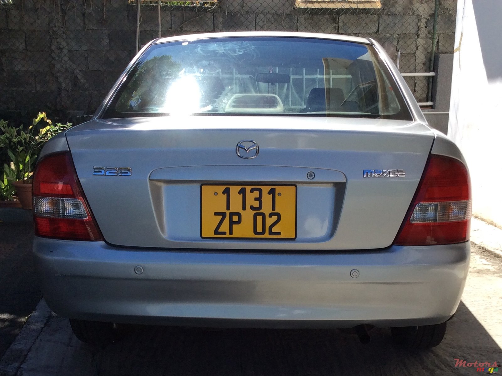 2002' Mazda 323 photo #2