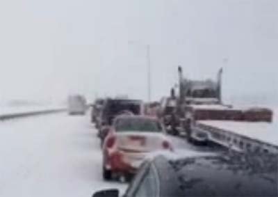Heavy Snow Causes 100-Car Pile-Up