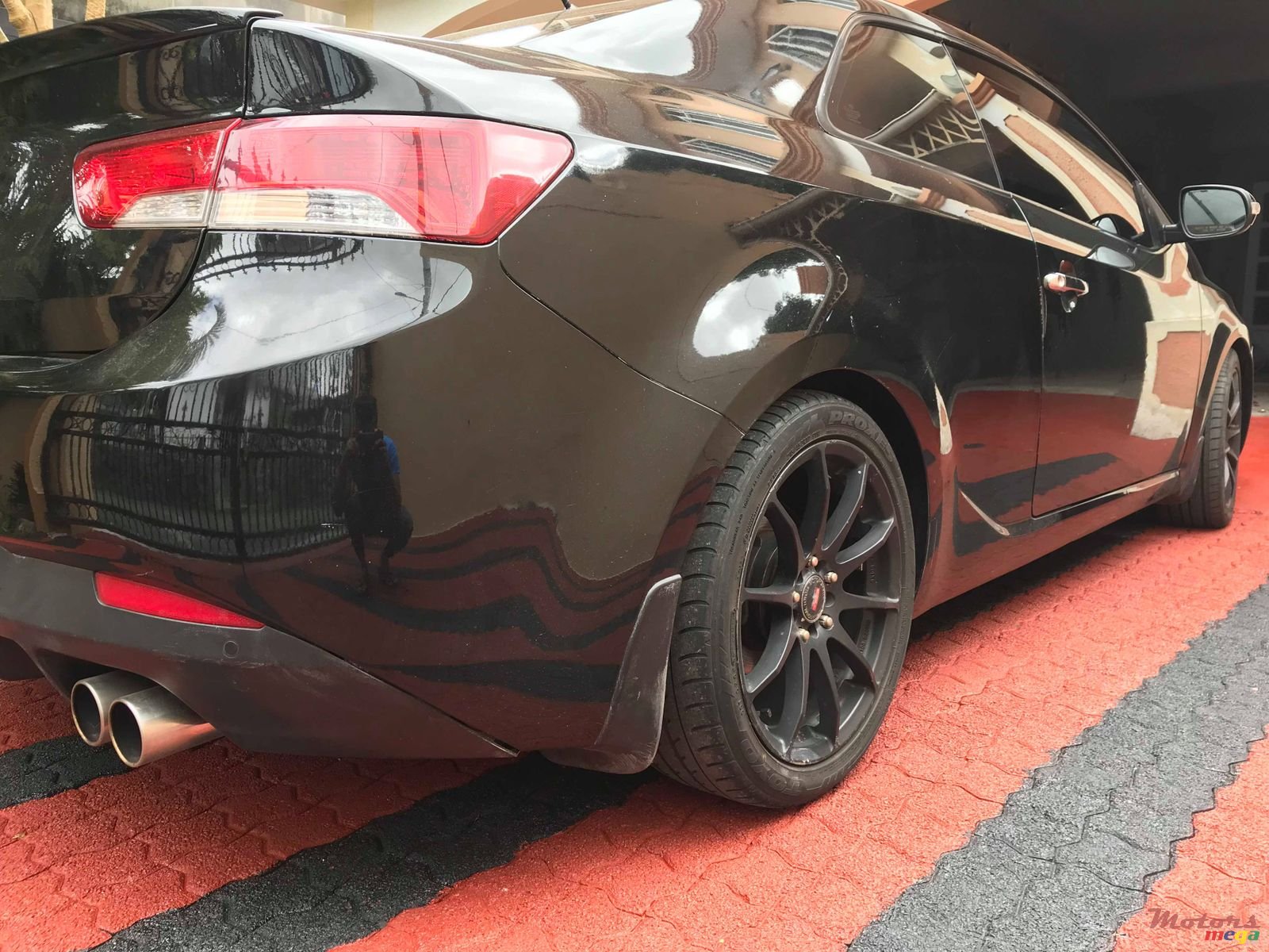 2010' Kia Koup Sport photo #4