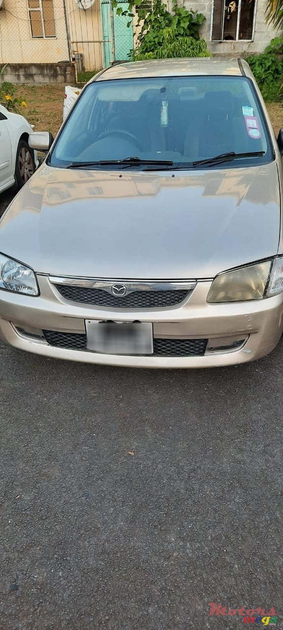 1999' Mazda 323 photo #5