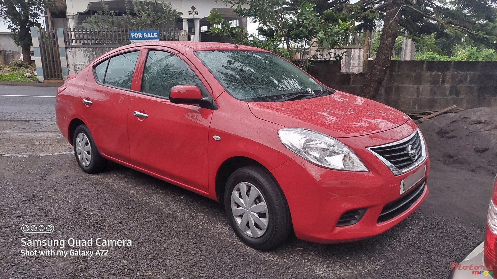 2012' Nissan Almera photo #1