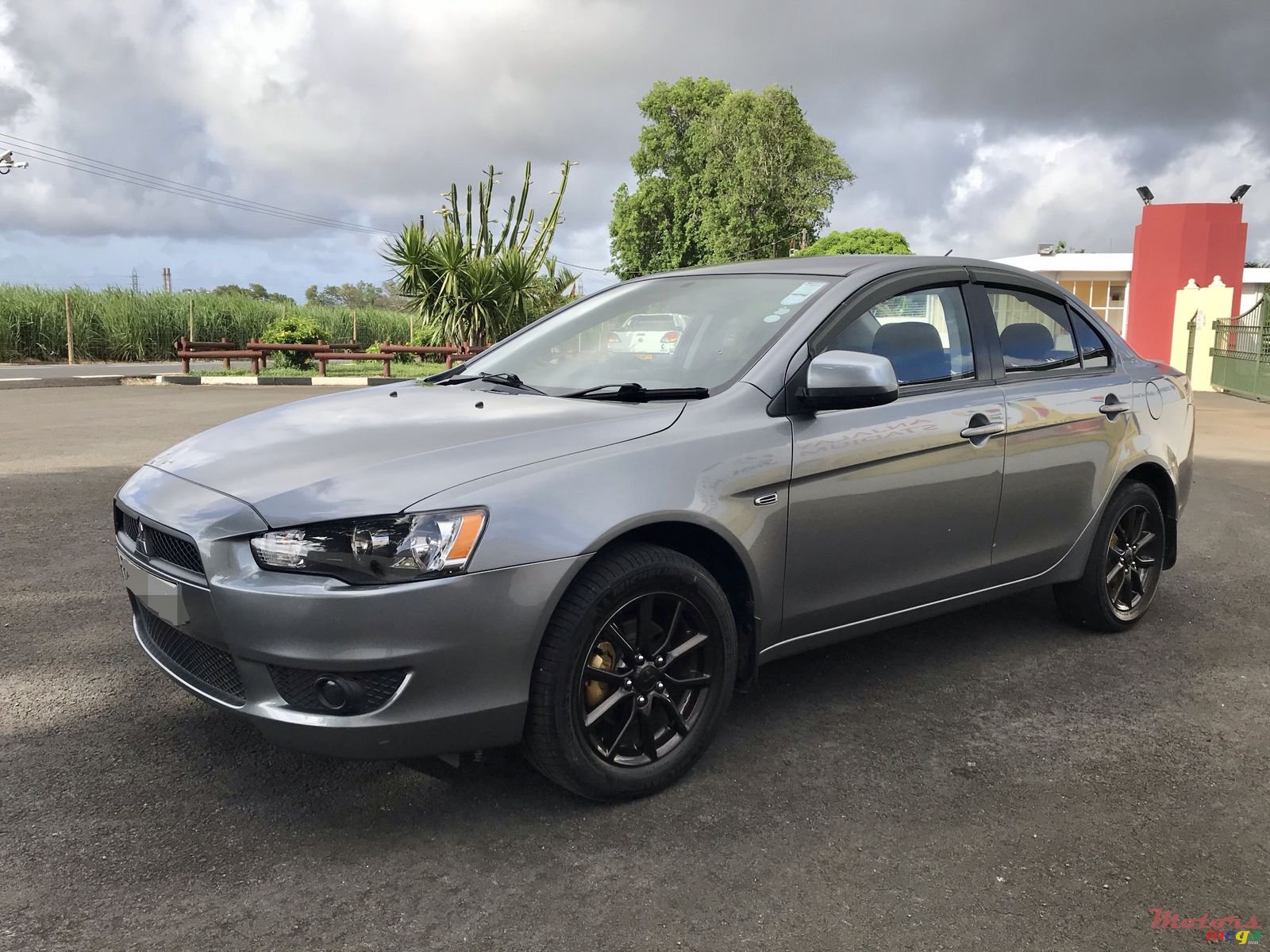 2014' Mitsubishi Lancer photo #2